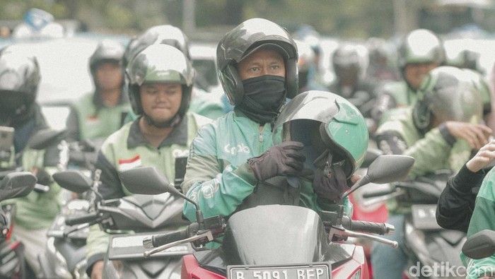 Menyeimbangkan Pemberian Bonus Hari Raya untuk Ojek Online