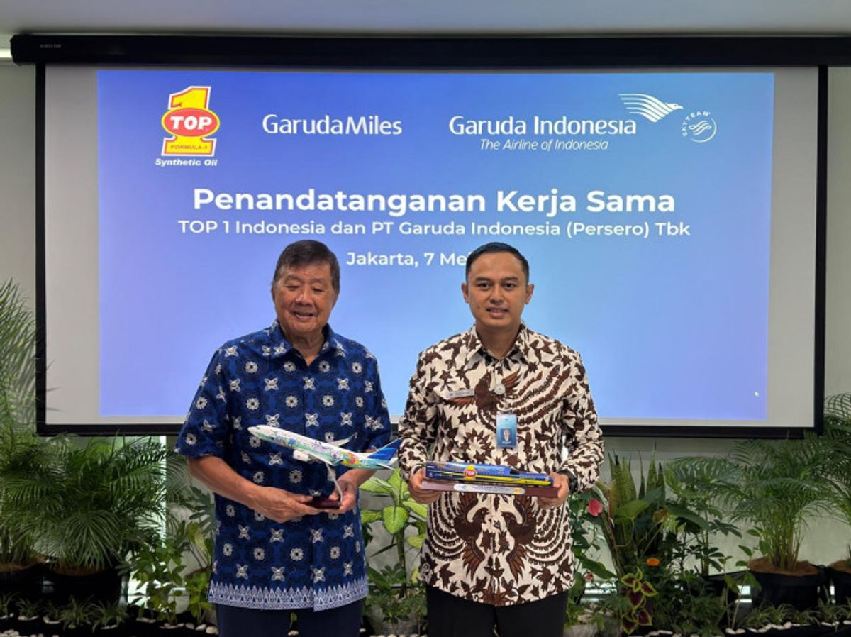 Garuda Indonesia Gandeng Top 1 Perluas Ekosistem GarudaMiles